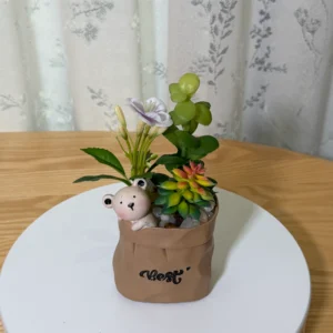 DR0141 (1) Arranjo de Suculentas Artificiais com Urso de Pelúcia